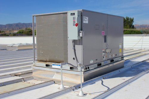 Standing Seam Roof Curb with HVAC unit on a standing seam metal roof